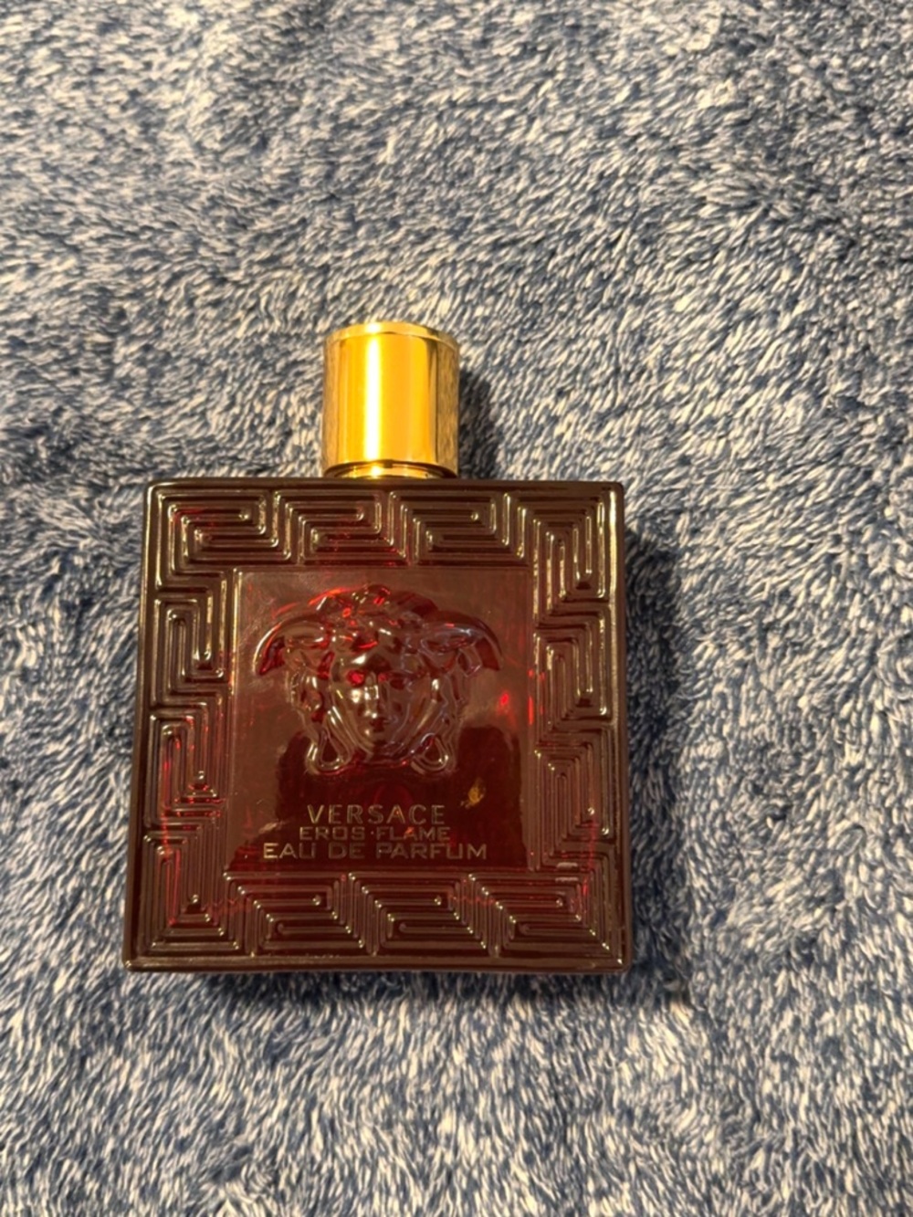 Versace Eros Flame Bottle in Deep Burgundy with Gold Cap